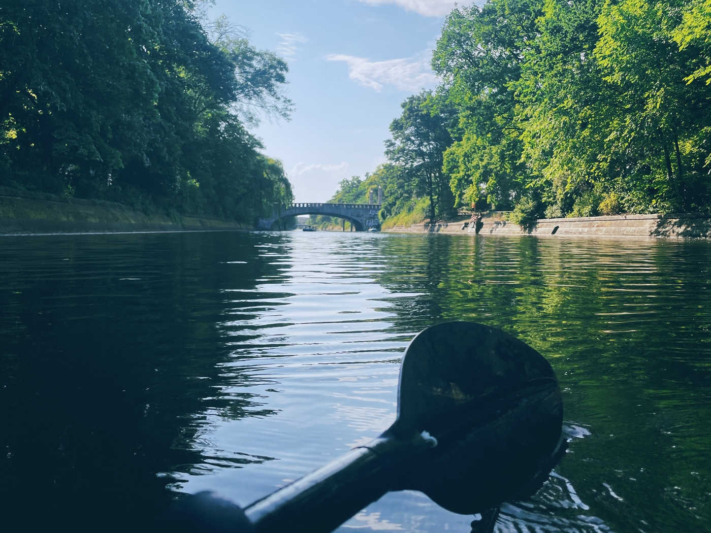 A wide angle of Sarah in the kayak in front of me, the canal all around us