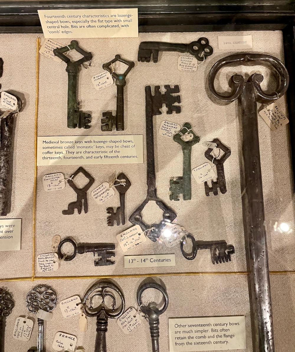 A display cabinet full of old keys