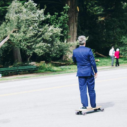 You know the devil from the Jamiroquai 'Feels Just Like It Should' video? Major vibes from this skating guy in a suit. 👹👔