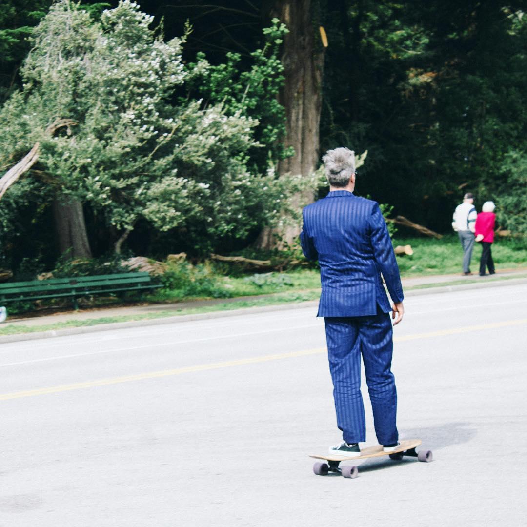You know the devil from the Jamiroquai 'Feels Just Like It Should' video? Major vibes from this skating guy in a suit. 👹👔