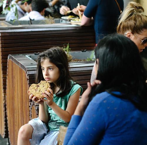 the girl is me, the cookie is all of life's riches and opportunities. 😐🍪