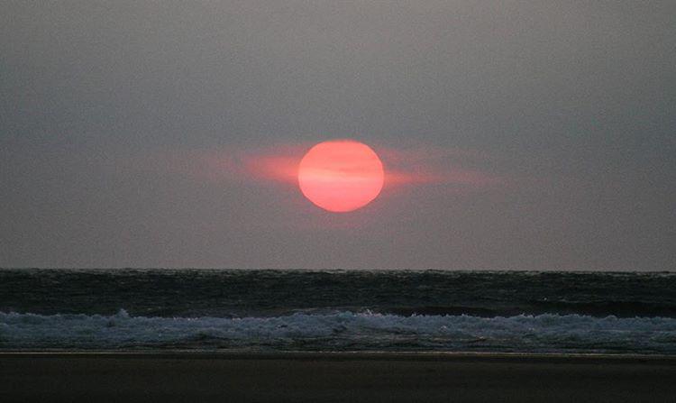 night. holographic sun, black ocean.