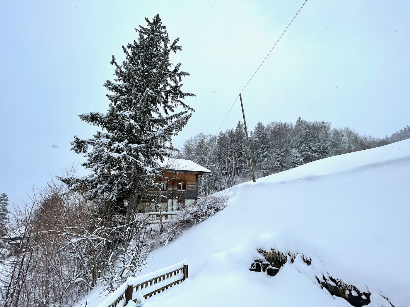 A Swiss house buried in snow