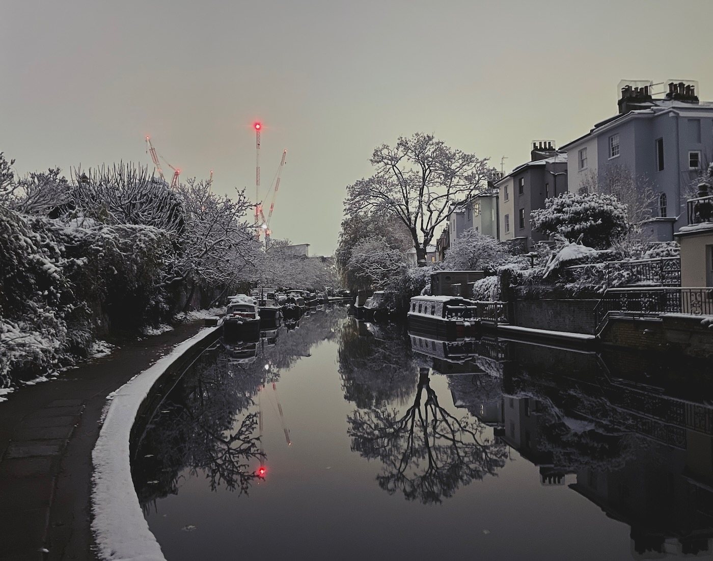 Regents Canal in the early morning with snow covering every surface