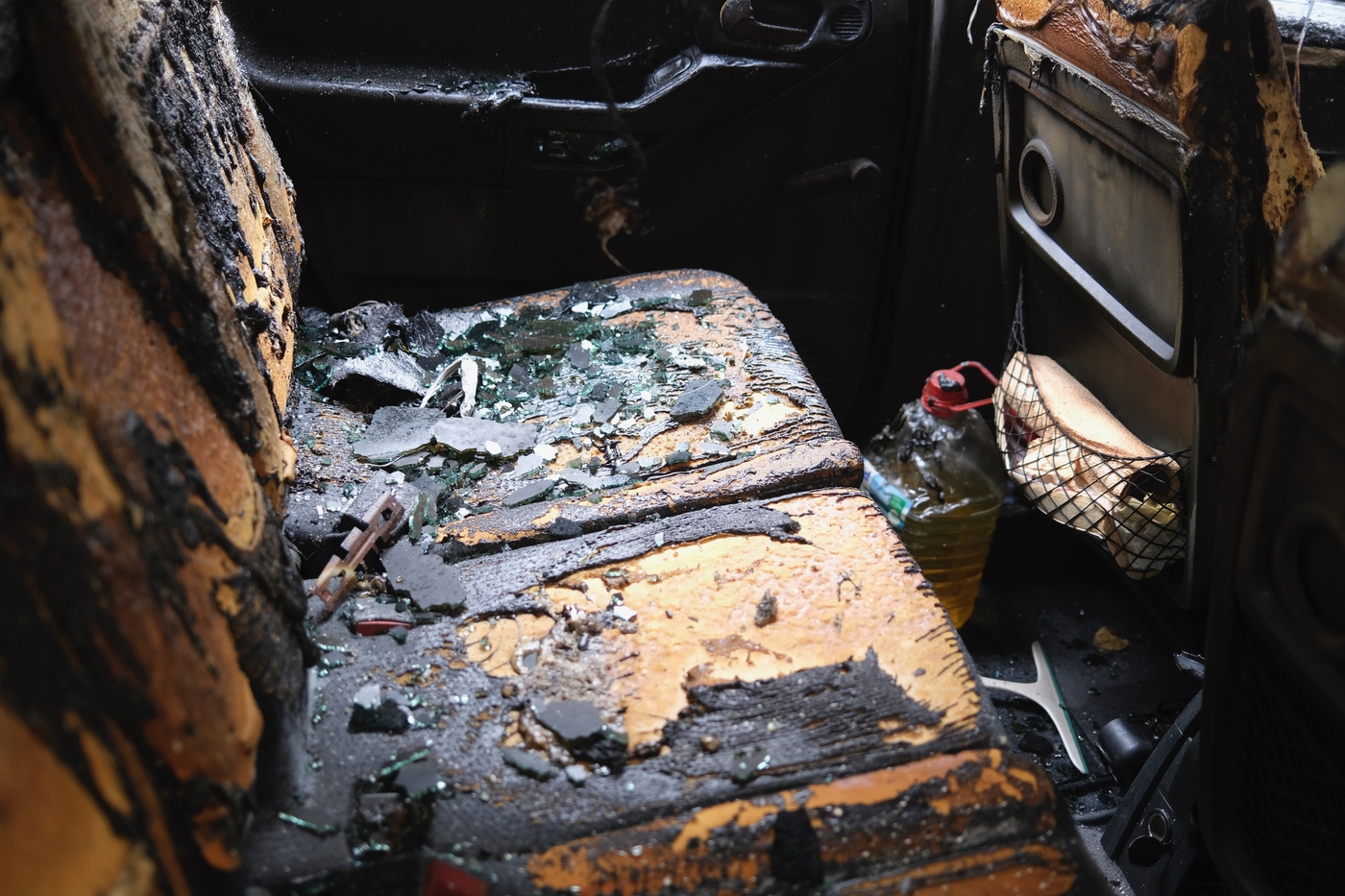 The back seat of a burned out car
